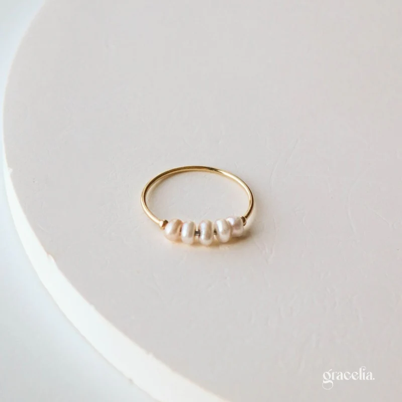 How can a ring inspire moments of calm and mindfulness? Explore the Serene Pearl Beaded Ring.